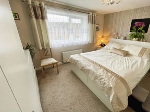Bedroom One- click for photo gallery